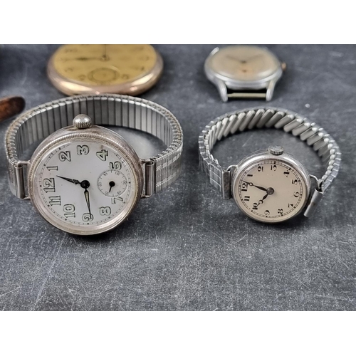 728 - A Swiss WWI trench watch, having unsigned white enamel dial with luminous Arabic markers, 34mm, the ... 