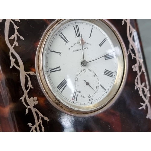 729 - A Continental white metal key wind open face pocket watch, stamped .935, the dial signed H E Peck Lo... 