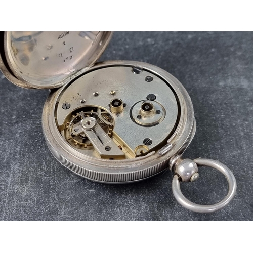 729 - A Continental white metal key wind open face pocket watch, stamped .935, the dial signed H E Peck Lo... 