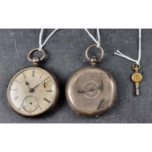 734 - A Victorian silver open faced pocket watch, having unsigned dial and movement, 52mm, key wind, Chest... 