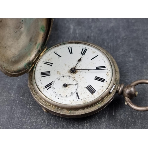 734 - A Victorian silver open faced pocket watch, having unsigned dial and movement, 52mm, key wind, Chest... 