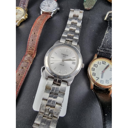 738C - A large quantity of wristwatches, to include a Tissot 'PR 50'; and examples by Swatch and Casio.... 