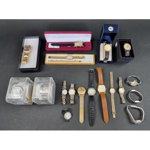 738D - A large quantity of wristwatches, to include two boxed Swatch examples.