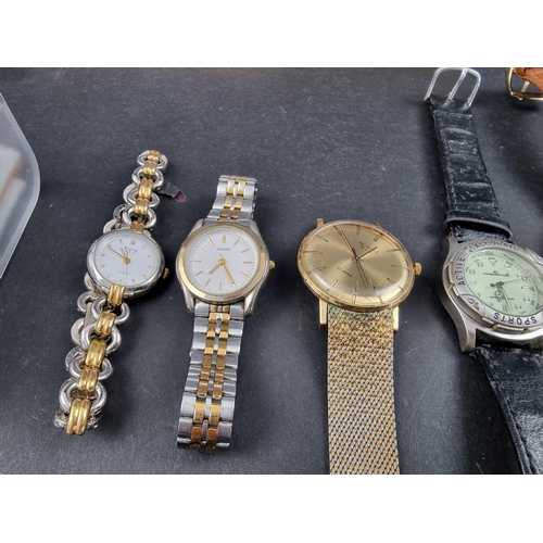 738D - A large quantity of wristwatches, to include two boxed Swatch examples.