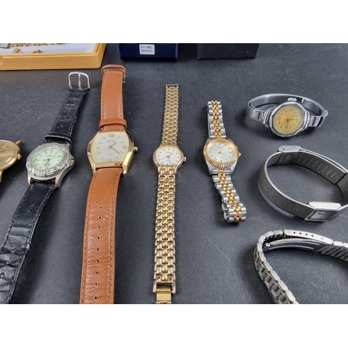 738D - A large quantity of wristwatches, to include two boxed Swatch examples.