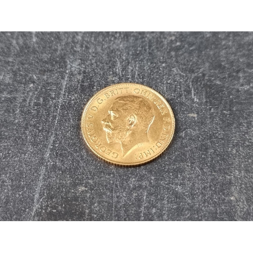 749 - Coins: a George V 1914 gold half sovereign.All proceeds to The Royal Botanical Gardens, Kew.... 