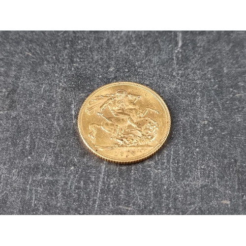 754 - Coins: a George V 1913 gold sovereign.