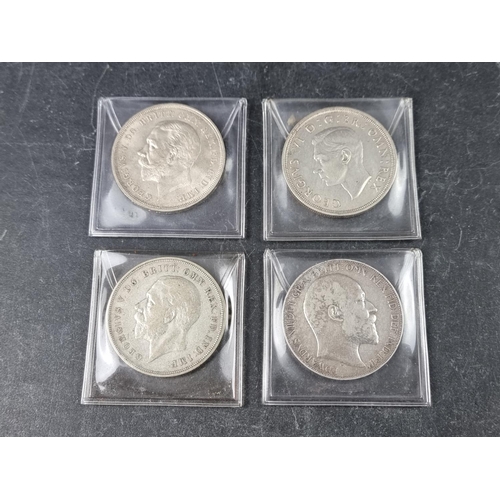 760 - Coins: an Edward VII 1902 silver crown; together with two George V 1935 crowns; and a George VI 1937... 