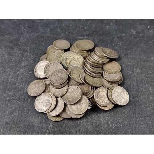 770 - Coins: one hundred George V silver and part silver 3d coins, 140g.