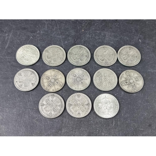 779 - Coins: thirteen various George V and George VI .500 silver florins. (13)