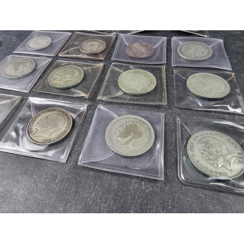 780 - Coins: nine various George V .500 silver half crowns; together with seven various George V silver fl... 