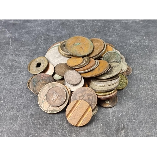 782 - Coins: a quantity of UK and other coins, to include a few silver examples.