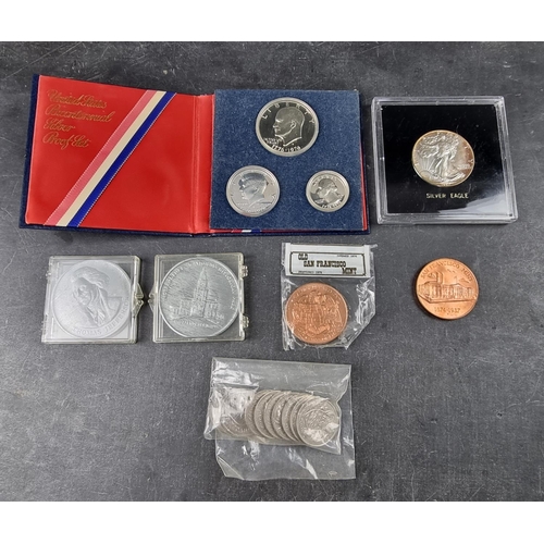 783 - Coins: a US Bicentennial silver proof coin set; together with a silver Eagle dollar, 1987; two San F... 