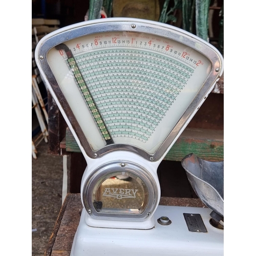 1624 - A set of Avery white enamel double sided weighing scales.