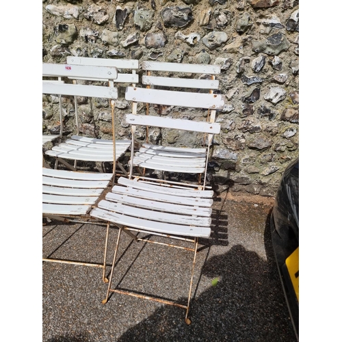 1636 - A set of four old folding garden chairs; together with another similar pair. (6)