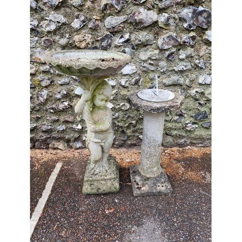 1641 - A composition stone figural bird bath, 87cm high; together with a pedestal sun dial. (2) ... 