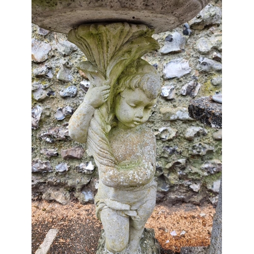 1641 - A composition stone figural bird bath, 87cm high; together with a pedestal sun dial. (2) ... 