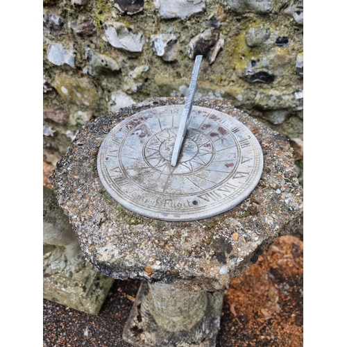 1641 - A composition stone figural bird bath, 87cm high; together with a pedestal sun dial. (2) ... 