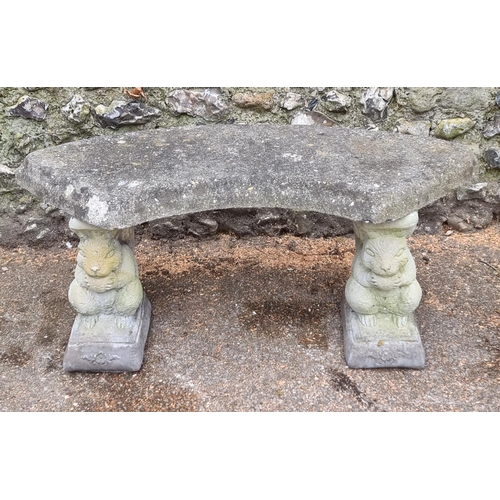 1643 - An old weathered composition stone curved garden seat, 106cm wide.