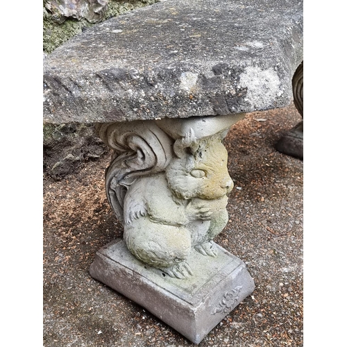 1643 - An old weathered composition stone curved garden seat, 106cm wide.