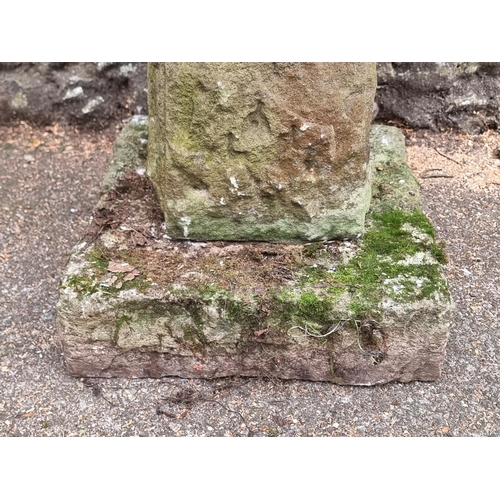 1647 - An old weathered composition stone pedestal bird bath, 76cm high; together with another garden ... 