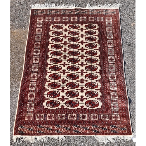 1657 - A Bokhara rug, having allover repeated decoration, 180 x 124cm.