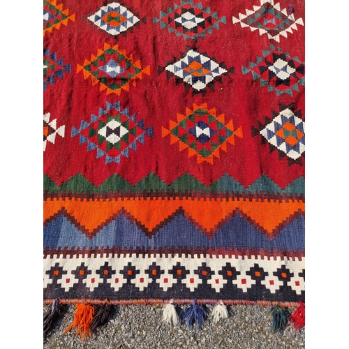 1661 - A Tribal Aztec rug, having allover geometric design, 270 x 158cm.
