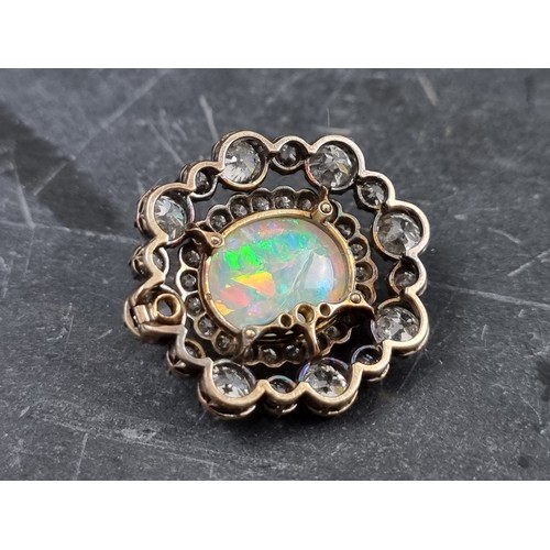 447 - An impressive Victorian opal and diamond brooch, set central cabochon opal, estimated at 8.5ct, surr... 