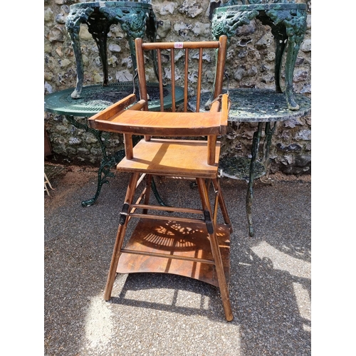 1134 - A vintage beech and plywood child's highchair.