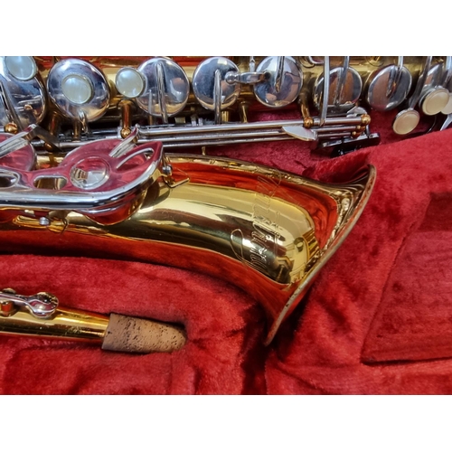 1594 - An Armstrong saxophone, in fitted case.  