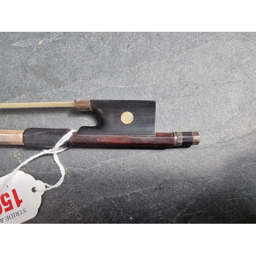 1596 - A white metal mounted violin bow, inscribed 'Gand & Bernardel', 74.3cm long.