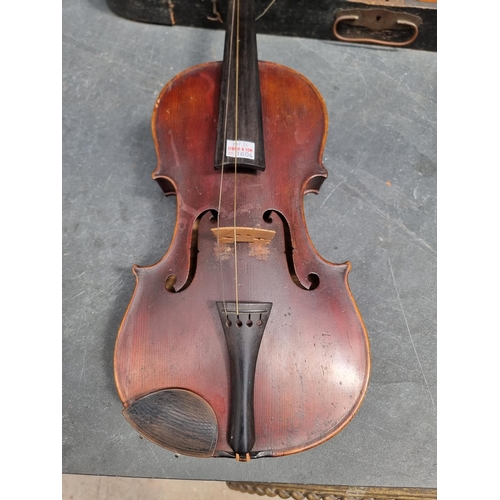 1604 - An antique Continental violin, inscribed on label 'Antonius Stradivarius, ...1727', with 14in two-pi... 