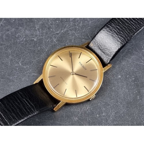 682 - A Tissot 'Stylist' gold plated manual wind wristwatch, 33mm, Ref. 41070-2X, on original black leathe... 