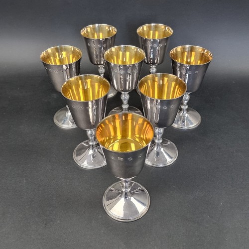 264A - A good cased set of eight silver goblets, by A Haviland-Nye, London 1972, with gilt interiors, 14.3c... 