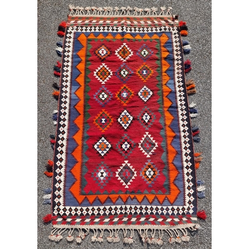 1134 - A Tribal Aztec rug, having allover geometric design, 270 x 158cm.