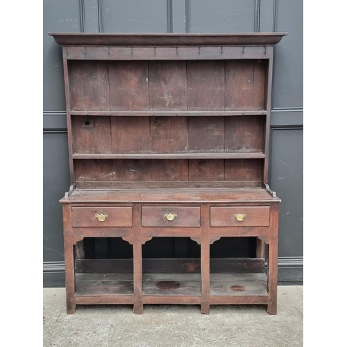 1000 - An 18th century oak 'Dog Kennel' dresser and rack, 152.5cm wide.