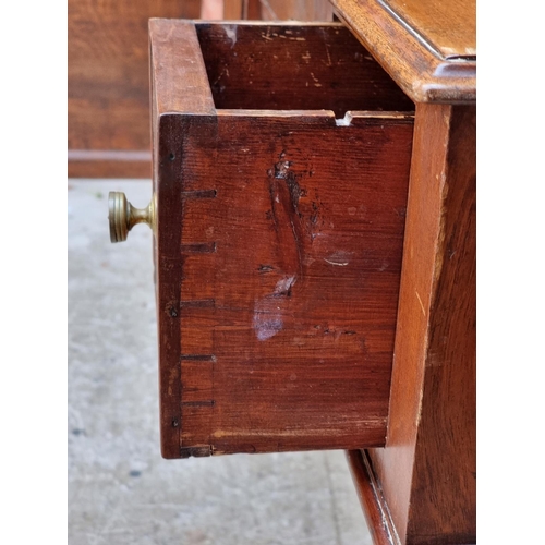 1007 - A George IV mahogany kneehole side table, 97cm wide.