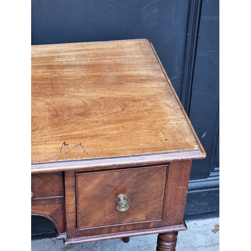 1007 - A George IV mahogany kneehole side table, 97cm wide.