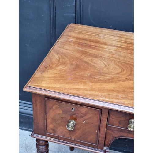 1007 - A George IV mahogany kneehole side table, 97cm wide.