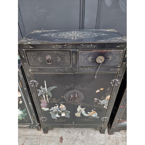 1012 - Three similar Chinese black lacquer side cabinets, one with soapstone decoration, largest 61cm ... 