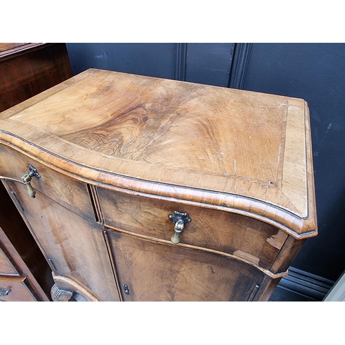 1016 - A small walnut bowfront chest of drawers, 45cm wide; together with another small walnut side ca... 