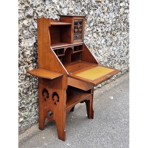 1024 - An Arts & Crafts walnut bureau, in the manner of Shapland & Petter, with lateral drop l... 