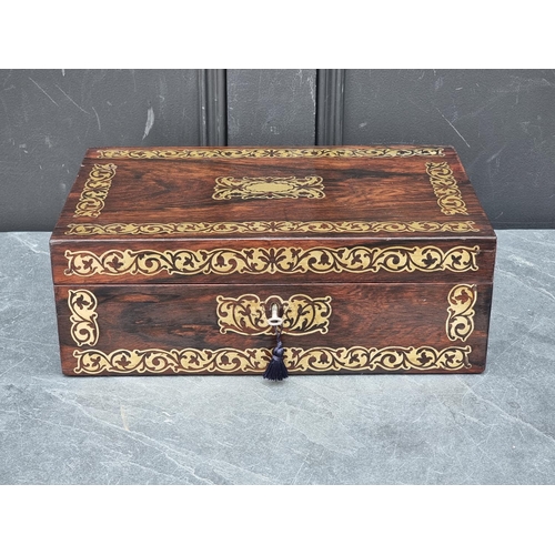 1034 - A 19th century rosewood and brass inlaid casket, with void interior, 36cm wide.