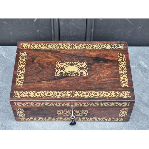 1034 - A 19th century rosewood and brass inlaid casket, with void interior, 36cm wide.