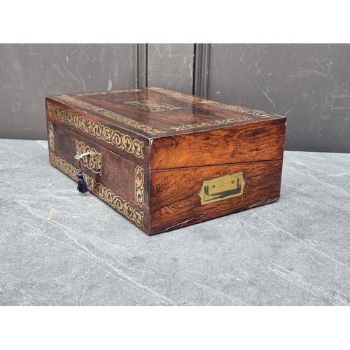 1034 - A 19th century rosewood and brass inlaid casket, with void interior, 36cm wide.