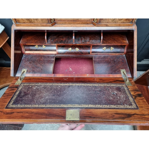 1037 - A Louis XV style walnut and inlaid bonheur du jour, with gilt brass mounts, 81cm wide.... 