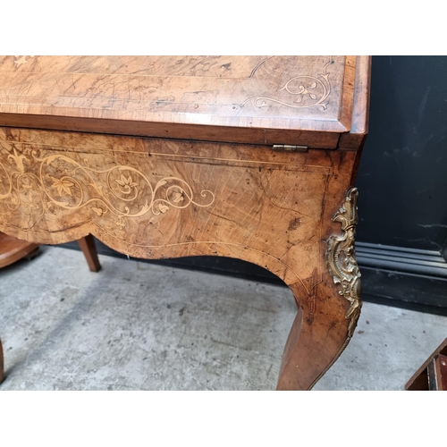 1037 - A Louis XV style walnut and inlaid bonheur du jour, with gilt brass mounts, 81cm wide.... 