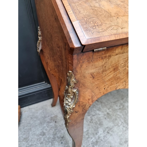 1037 - A Louis XV style walnut and inlaid bonheur du jour, with gilt brass mounts, 81cm wide.... 