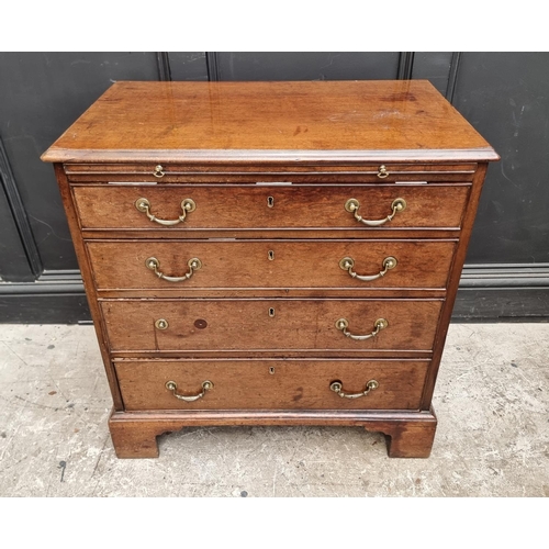 1045 - A small George III mahogany chest of drawers, with brushing slide, 76cm wide.