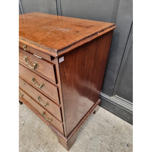 1045 - A small George III mahogany chest of drawers, with brushing slide, 76cm wide.